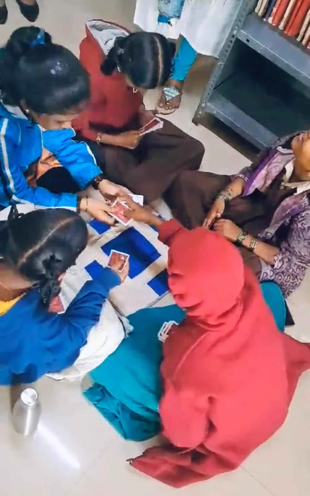 Using Junior braille playing cards.